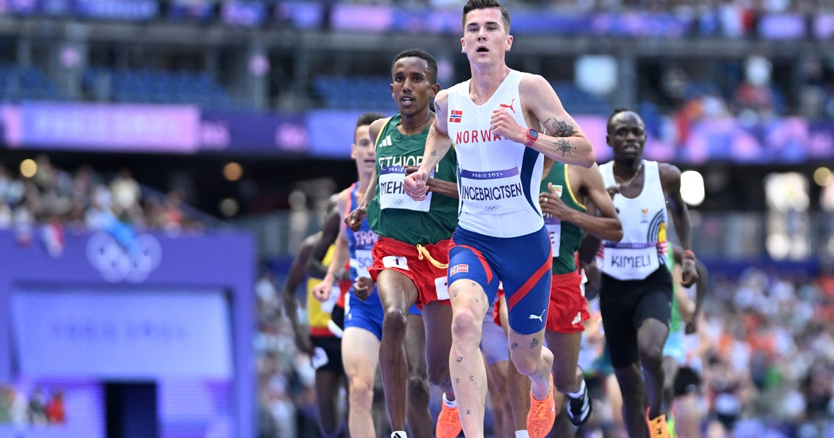 NextImg:Cameraman Is Focus Of Internet Scorn After Interfering With Runners At Olympics
