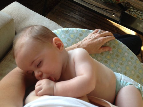 The author breastfeeds her youngest son.
