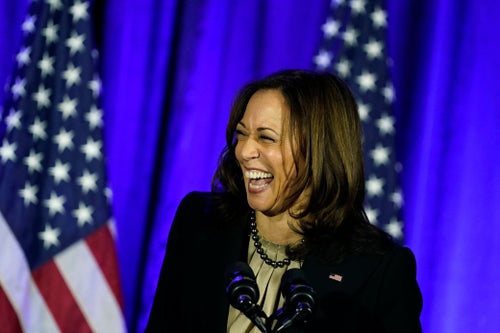 In 2021, U.S. Vice President Kamala Harris laughs as she speaks during a holiday reception for the Democratic National Committee at Hotel Washington, in Washington, D.C.