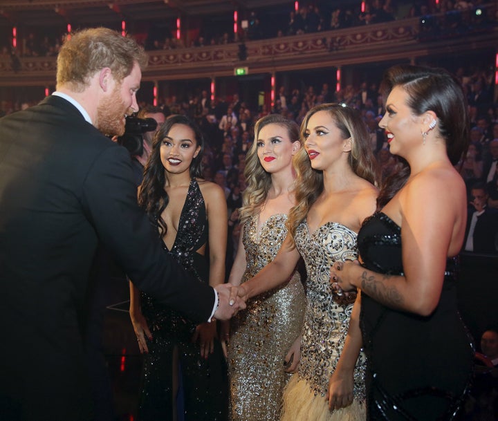 Prince Harry meeting Little Mix after the Royal Variety in 2015