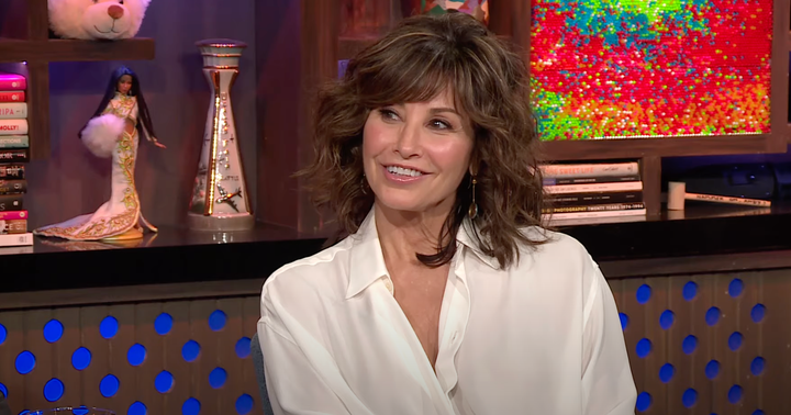 Gina Gershon being interviewed on Watch What Happens Live