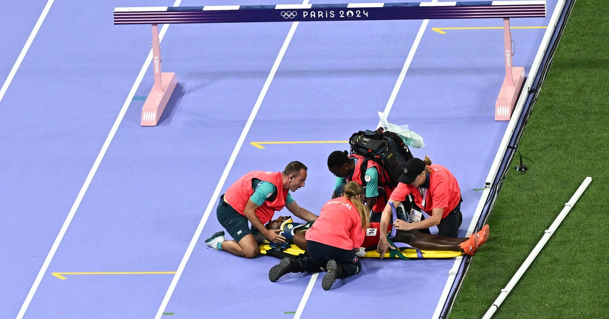 NextImg:Medal Favorite Carried Off Track After Brutal Fall During Olympic Final