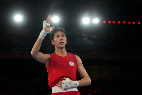 Lin Yu-ting celebrates after defeating Turkey's Esra Yildiz in their women's 57kg semifinal boxing match on Wednesday.