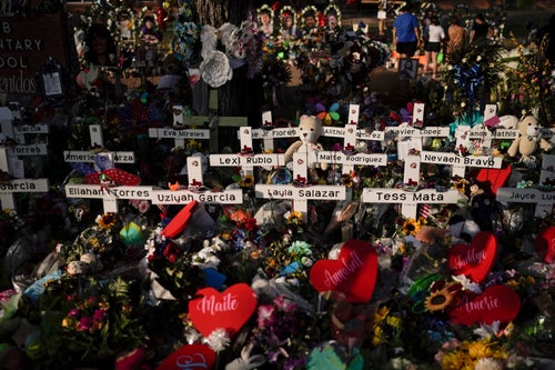 A photo shows a memorial at Robb Elementary School on May 31, 2022, in Uvalde, Texas, following a school shooting that killed 21 people.