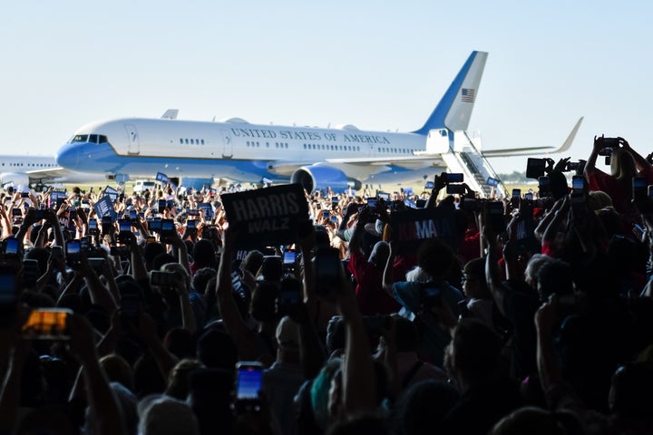 Air Force Two taxis as several thousand attendees applaud for Kamala Harris and Tim Walz at Detroit Metropolitan Wayne County Airport on Aug. 7, 2024. 