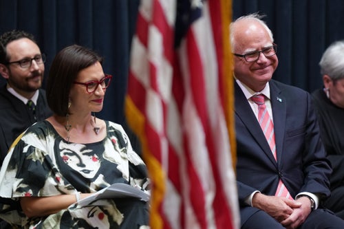 Minnesota Lieutenant Gov. Peggy Flanagan and Gov. Tim Walz listen during the swearing-in ceremony of Justice Sarah Hennesy to the state Supreme Court in July. Behind Flanagan, with beard, is Associate Justice Karl Procaccini. Justice Hennesy's formal investiture ceremony at the Landmark Center, St. Paul, Minn. (Photo by Glen Stubbe/Star Tribune via Getty Images)