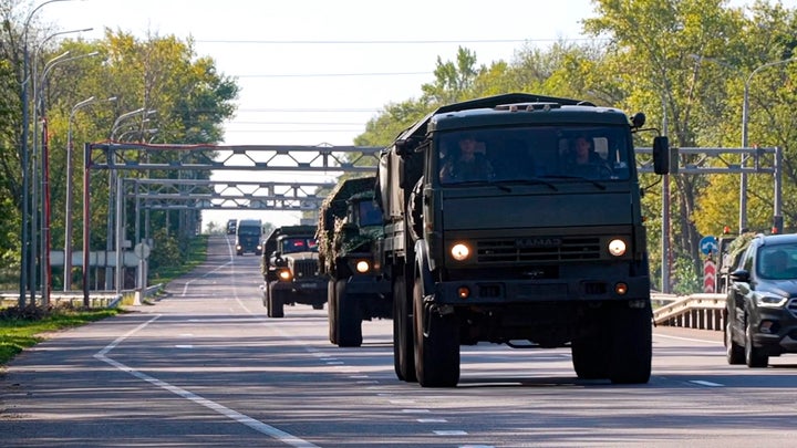 A column of the Russian Armed Forces move to build up forces conducting active combat operations with Ukrainian formations in the Sudzhansky district of Kursk region of Russia.