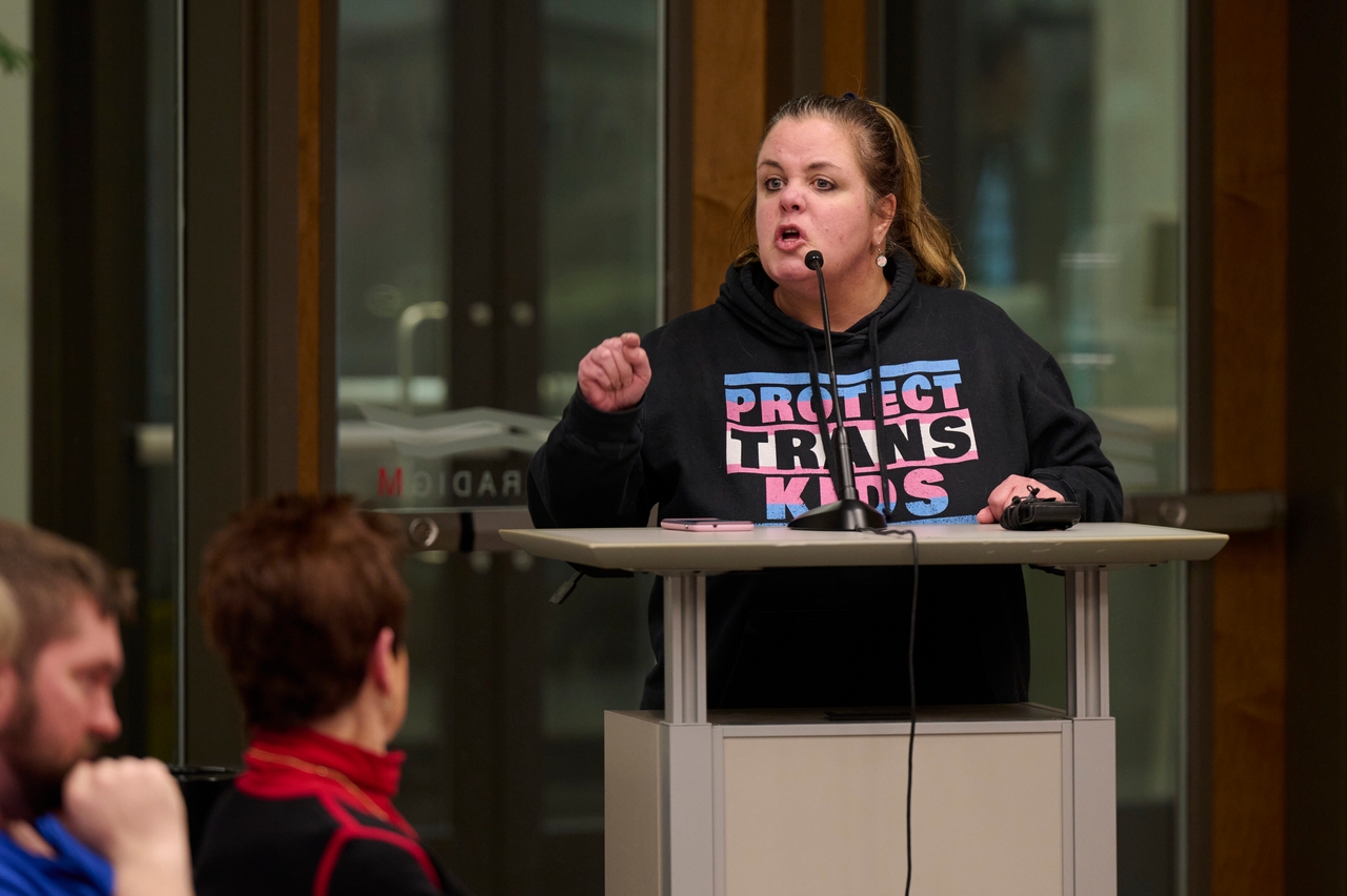 Anne Anderson passionately voices her opposition to a resolution that would oppose federal protections for trans students in public schools under Title IX during a school board meeting on March 14, 2023.