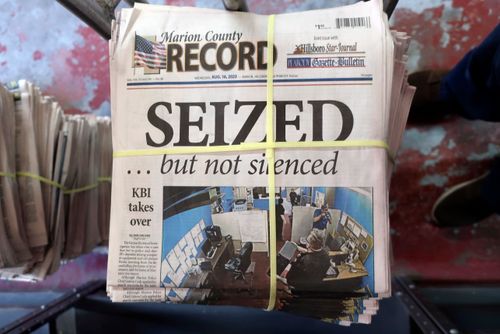 A stack of the Marion County Record sits in the back of the newspaper's building, awaiting unbundling, sorting and distribution, Aug. 16, 2023.