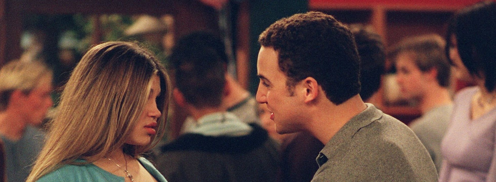 Ben Savage touching Fishel’s stomach in "She's Having My Child Again Ribs."