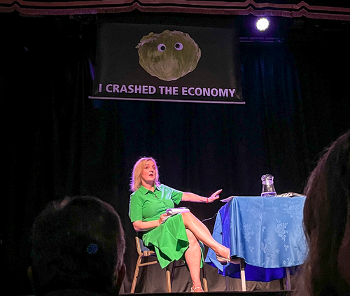 Liz Truss was outshone on stage by a lettuce banner.