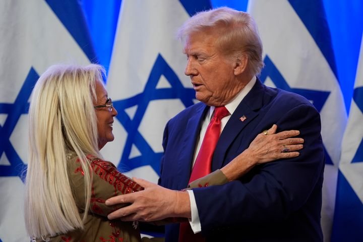 Former President Donald Trump greets Miriam Adelson during an event on combating antisemitism at Trump National Golf Club on Thursday in Bedminster, New Jersey.