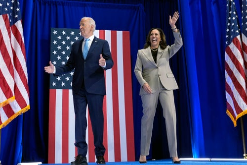 President Joe Biden (left) and Vice President Kamala Harris, the Democratic presidential nominee, arrive to speak about the administration's efforts to lower costs during an event at Prince George's Community College in Largo, Maryland, on Thursday.