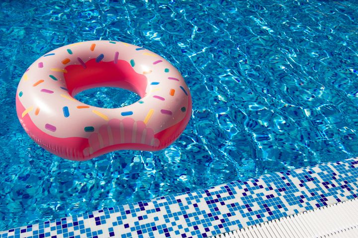 Swimming circle, donut-shaped rubber circle in a swimming pool.