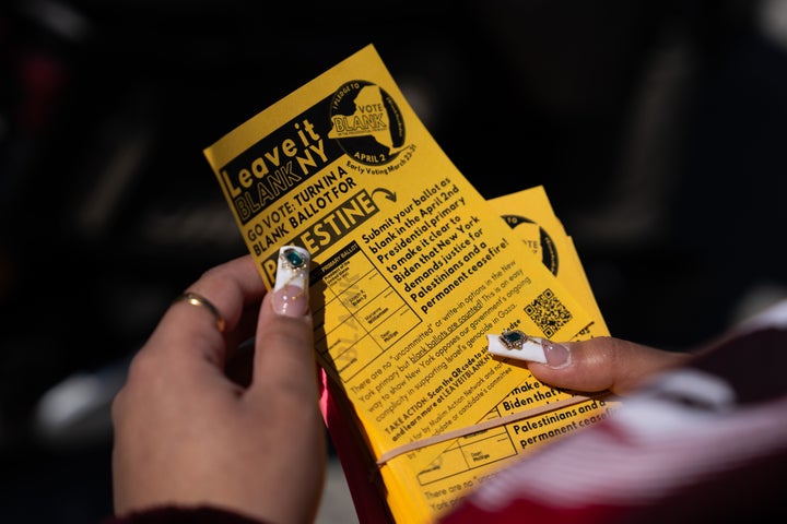 A person holds a "Leave it Blank" flyer outside of the Masjid Al-Abidin mosque on March 29 in Queens, New York City. The campaign sought to persuade primary voters to submit empty ballots in protest of the Biden administration's handling of the Gaza conflict between Israel and Hamas.