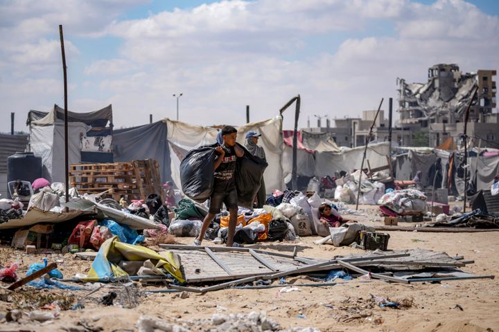 Palestinians displaced by the Israeli air and ground offensive on the Gaza Strip flee from Hamad City, following an evacuation order by the Israeli army to leave parts of the southern area of Khan Younis, Sunday, Aug. 11, 2024.