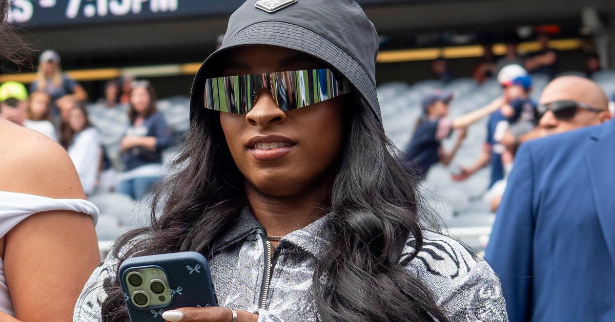 Simone Biles Causes Stir For Wearing Jonathan Owens-Themed Packers Jacket To Bears Game