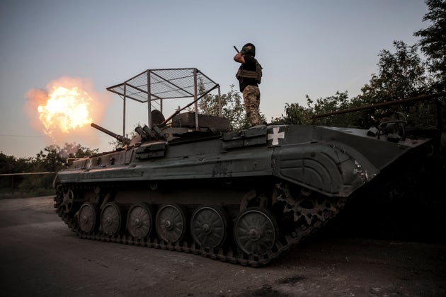 Servicemen of 24th mechanised brigade fire from BRM1k infantry fighting vehicle towards Russian positions near Chasiv Yar town, in Donetsk region, Ukraine, Saturday, Aug. 17, 2024.