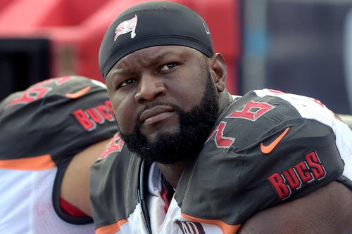 Then-Tampa Bay Buccaneers tackle Gosder Cherilus is seen during a 2015 NFL football game against the Carolina Panthers. He allegedly urinated on a passenger during a flight over the weekend.