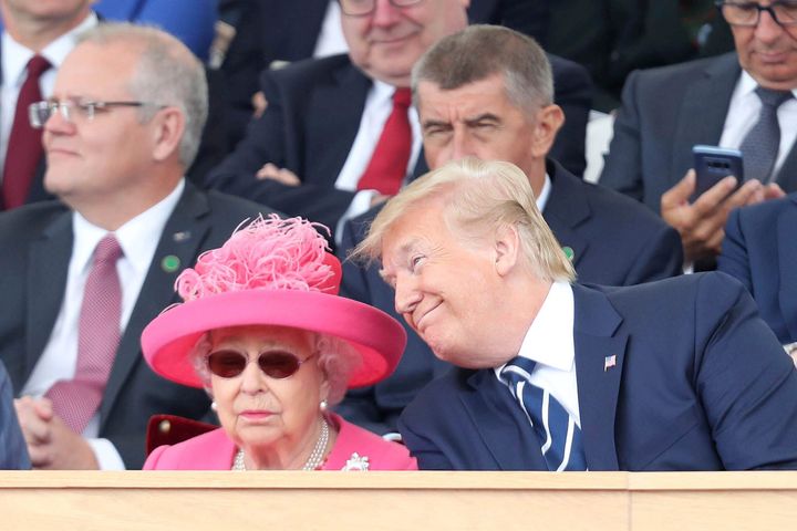 The late Queen Elizabeth and former US President Donald Trump look on during commemorations for the 75th Anniversary of the D-Day landings at Southsea Common, Portsmouth, England, Wednesday, June 5, 2019