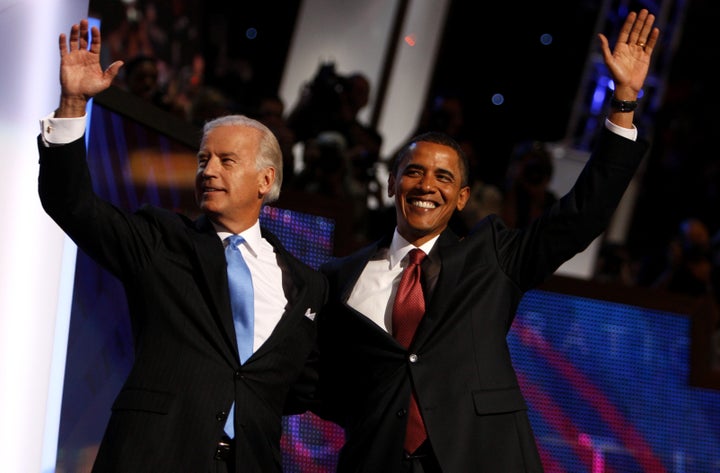 Then Democratic presidential candidate, Sen. Barack Obama, right, and Democratic vice presidential candidate, Sen. Joe Biden, are seen at the Democratic National Convention in Denver, on Aug. 27, 2008. 