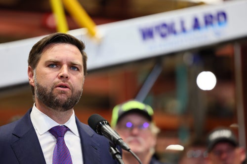 JD Vance speaks on Aug. 7 in Eau Claire, Wisconsin. Donald Trump's running mate accused Kentucky Gov. Andy Beshear of "wishing" someone in his family "would get raped" in a Tuesday post on X.
