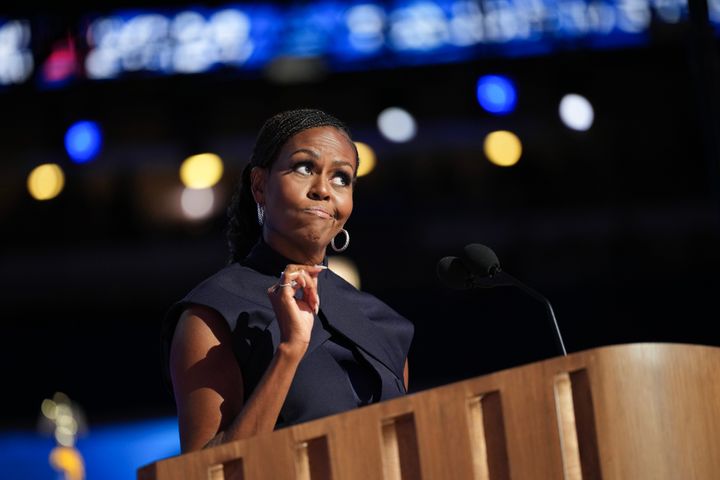 Former first lady Michelle Obama speaks on stage during the second day of the Democratic National Convention at the United Center on Tuesday in Chicago, Illinois. 