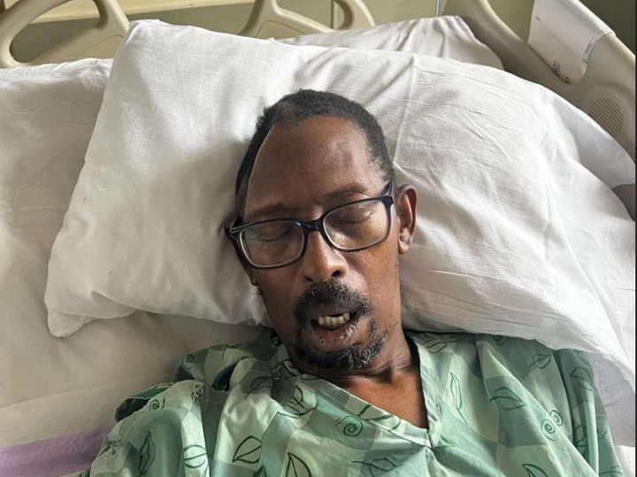 A photo provided by his attorney shows plaintiff Fernando Cluster, 62, in the hospital. He has been charged over $220,000 for medical expenses related to several surgeries he had at Emory University Hospital Midtown in Atlanta, according to a lawsuit filed in early August.