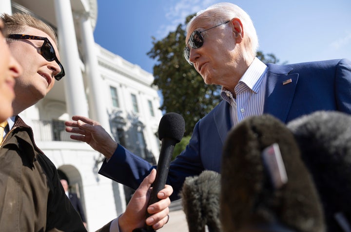 Joe Biden, right, answers a question from Fox News' Peter Doocy on Nov. 9, 2023.