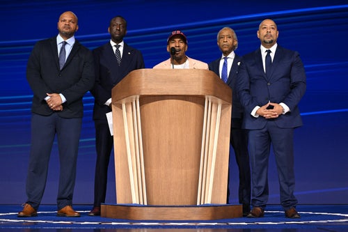 Civil rights activist Rev. Al Sharpton is joined onstage by members of the "Central Park Five," activist Kevin Richardson, New York City Council member Yusef Salaam, Korey Wise, and Raymond Santana on the fourth and last day of the Democratic National Convention in Chicago on Aug. 22, 2024.
