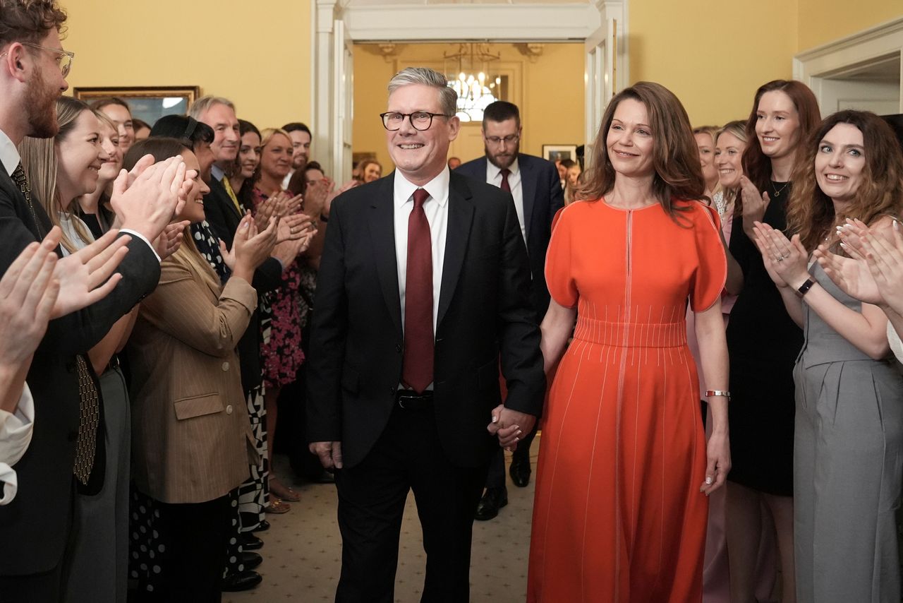 Keir Starmer and his wife Victoria enter 10 Downing Street for the first time after Labour's landslide victory.