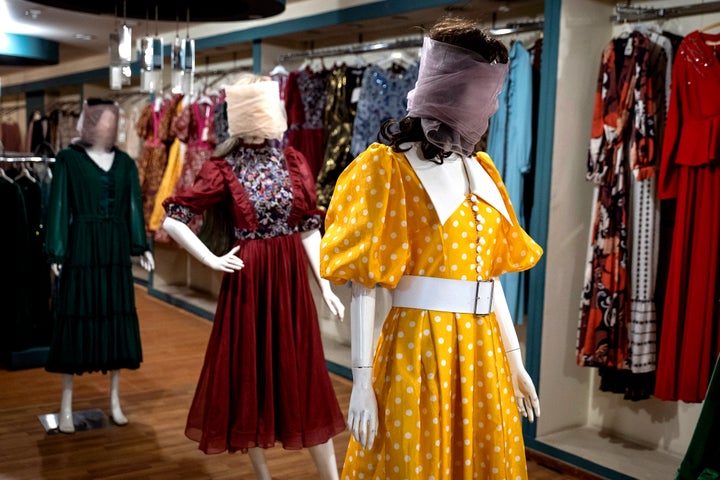 This photograph taken on July 22, 2024, shows veiled mannequins dressed in women's attire, at a shop in Kabul.