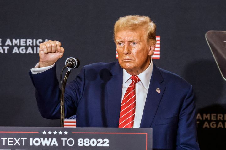 Former US President and Republican presidential hopeful Donald Trump departs after speaking at a "Commit to Caucus" rally in Clinton, Iowa, on January 6, 2024. 