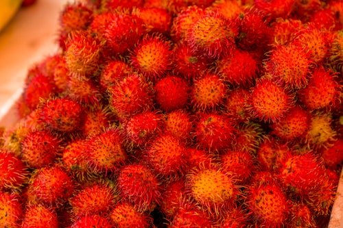 Rambutan, pictured here in a market in Oaxaca City, Mexico, "shares many skin care benefits with retinol," according to dermatologist Dr. Dendy Engelman.
