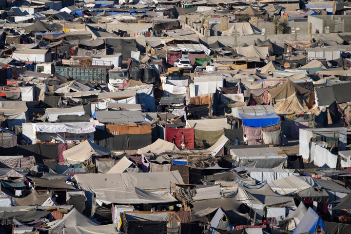 Tents are crammed together as displaced Palestinians camp on the beach, west of Deir al-Balah, Gaza Strip, Tuesday, Aug. 20, 2024. (AP Photo/Abdel Kareem Hana)