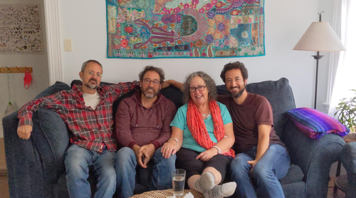 The author, in turquoise, is pictured with her three sons (from left to right) Zac, Orion and Josh