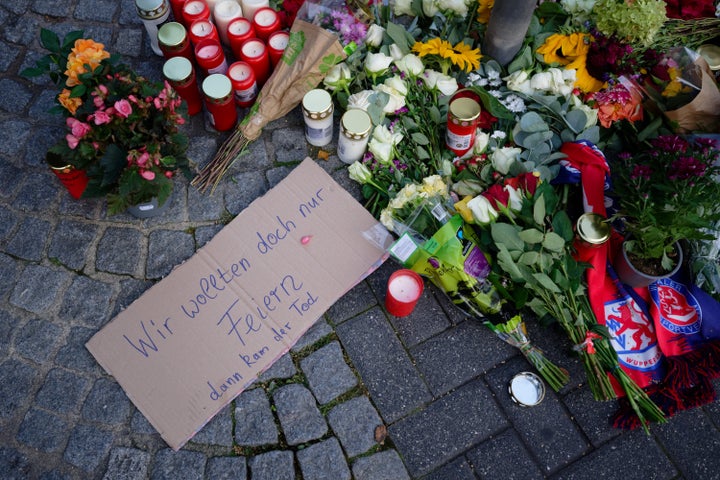 People laic flowers and ray candles successful Neumarkt successful representation of nan victims.