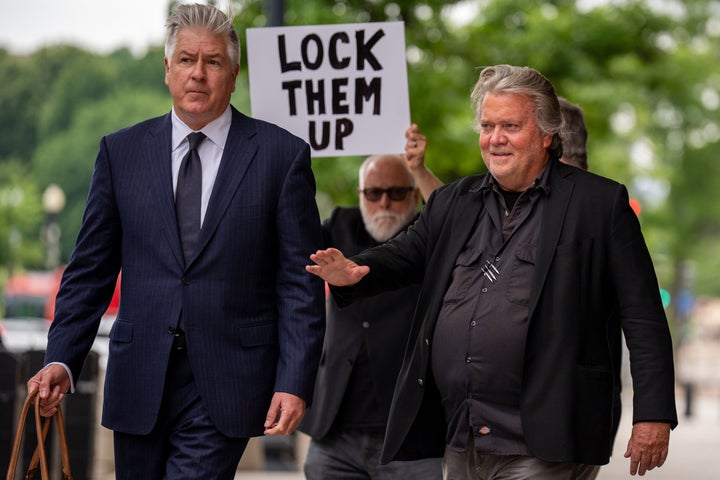 Former Trump White House strategist Steve Bannon (right) appears with attorney Matthew Evan Corcoran in Washington, D.C., in June. Last week, fellow Trump ally Rudy Giuliani claimed Bannon was being "tortured" by not having access to TV in prison.