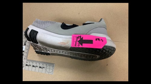 Police said they found a cut-up Nike shoe consistent with the pair worn by the suspect in reporter Jeff German’s murder beneath a couch in Robert Telles’ home. A Ziploc baggie found next to it contained bits and pieces of the companion shoe, prosecutors said.