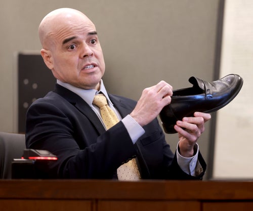 Robert Telles shows that he wears shoe lifts during his narrative on the witness stand on the witness stand during Telles' murder trial at the Regional Justice Center in Las Vegas, Thursday, Aug. 22, 2024. (K.M. Cannon/Las Vegas Review-Journal via AP, Pool)