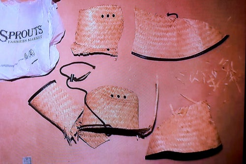 Prosecutors said a cut-up straw hat found by police during a search of Robert Telles’ home and garage is consistent with the one worn by the suspect in Jeff German's killing.