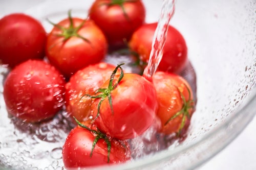 Your dishwasher’s surface is coated with residue of the cleaning chemicals in your detergent. If you use rinse aid, some leftovers in the dispenser will likely be released mid-cycle and come in contact with your produce.