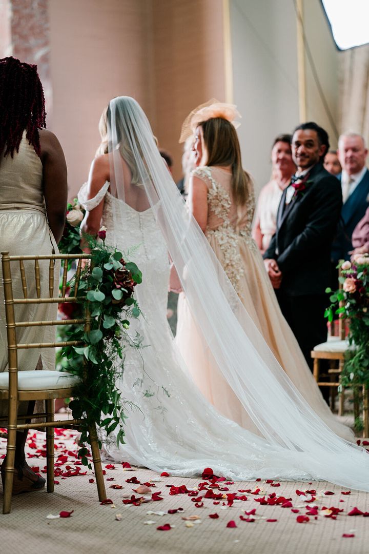 Jasmine was walked down the aisle by her mum