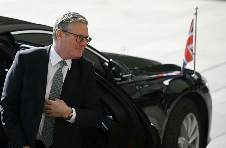 Keir Starmer gets out of his car before being greeted by the German Chancellor with an official welcome ceremony at the Chancellery in Berlin, Wednesday Aug. 28, 2024. 