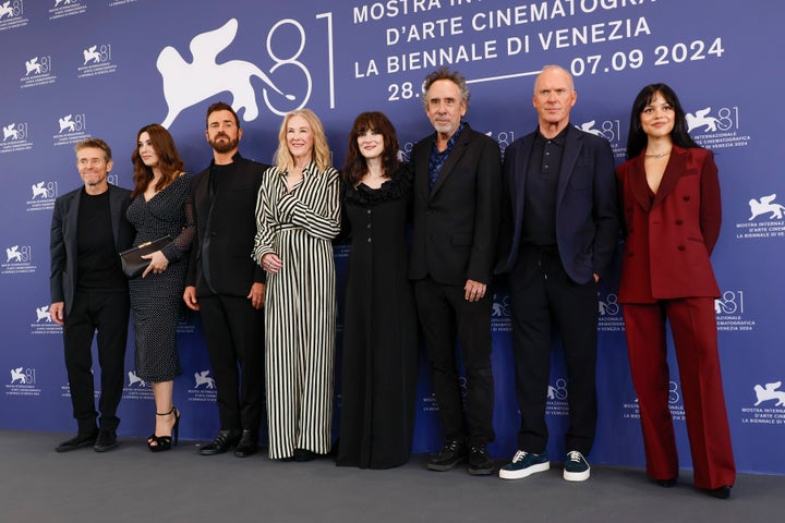 (L-R) Willem Dafoe, Monica Bellucci, Justin Theroux, Catherine O'Hara, Winona Ryder, director Tim Burton, Michael Keaton, and Jenna Ortega