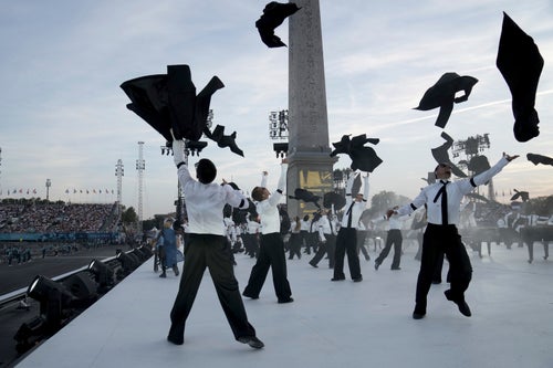 Artists perform at the start of the opening ceremony.