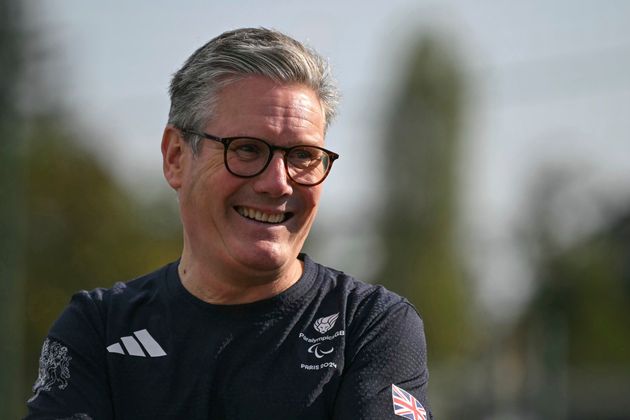 Keir Starmer reacts as he visits a training centre in Saint-Germain-en-Laye, northwest of Paris, ahead of the Paris 2024 Paralympic Games.