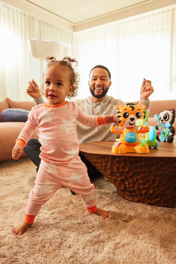 John Legend and his 1-year-old daughter, Esti Maxine Stephens.