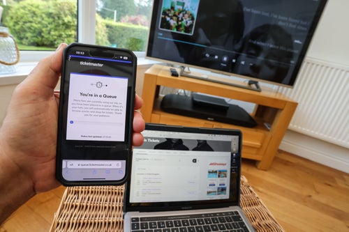 BLACKWOOD, WALES - AUGUST 31: A photo illustration showing the Ticket outage demand for OASIS concert tickets after the Gallagher brothers announce that they will be touring the UK and Ireland in 2025 on August 31, 2024 in Blackwood Wales. (Photo by Huw Fairclough/Getty Images)