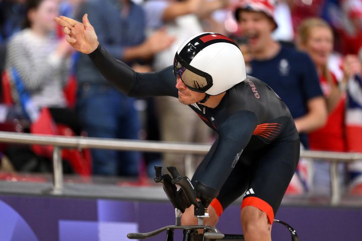 Jaco van Gass of Team Great Britain acknowledges the crowd after setting a new world record. 